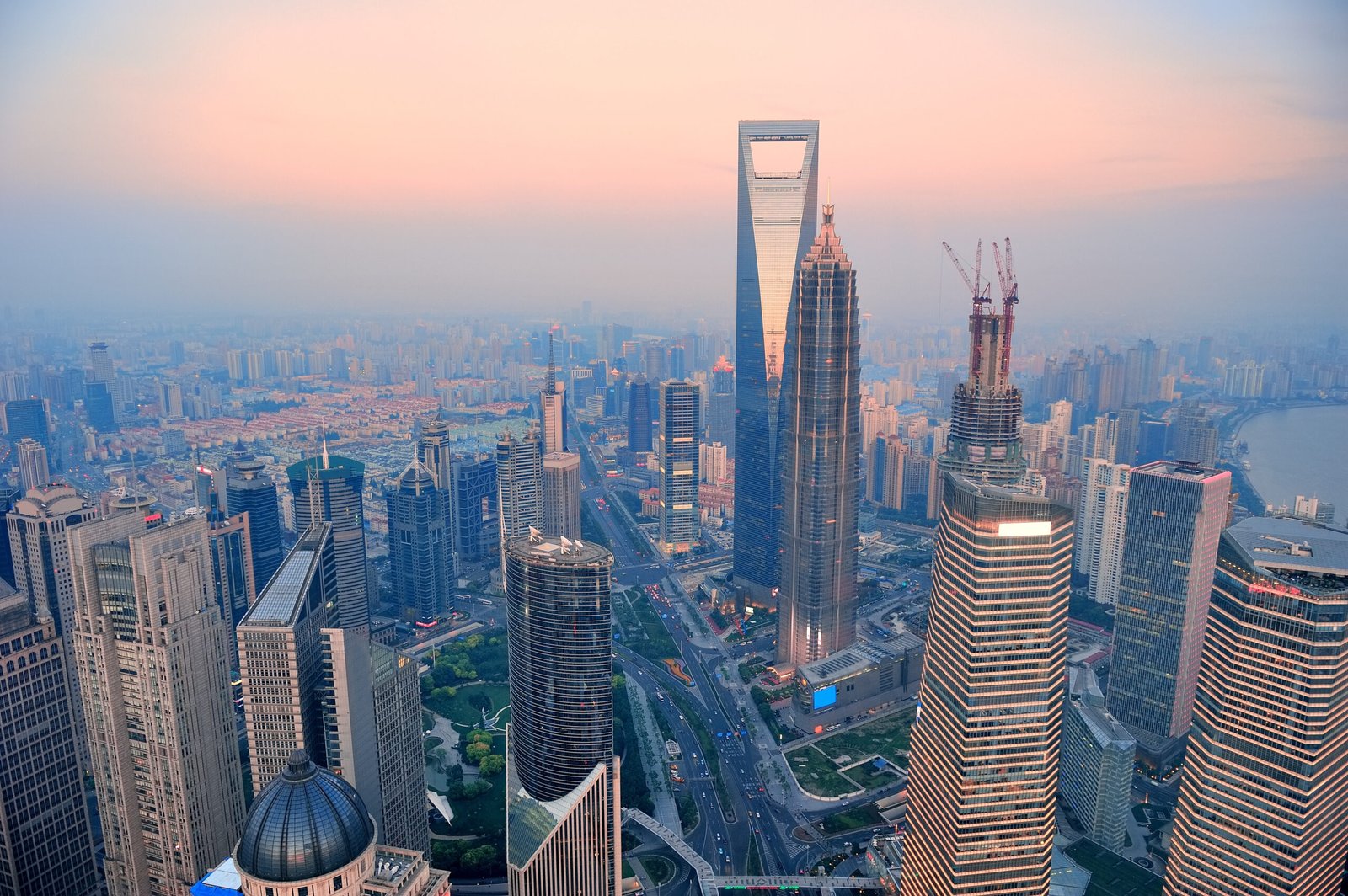 Shanghai aerial view with urban architecture and sunset